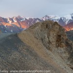 Cycling Polychrome Pass during a midnight sunset