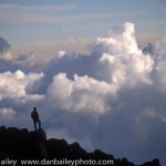 Silhouette of a hiker in the mountains above the clouds, Mexico