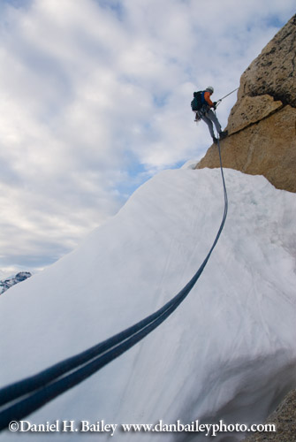 Eric Parsons rappelling from the top of The Throne, Pika Glacier, Alaska