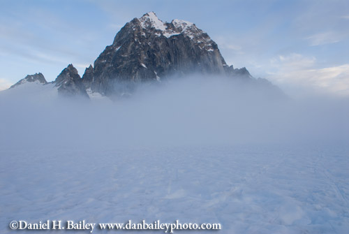 Fog rolling into the Pika Glacier past The Royal Tower, Little Switzerland, Alaska