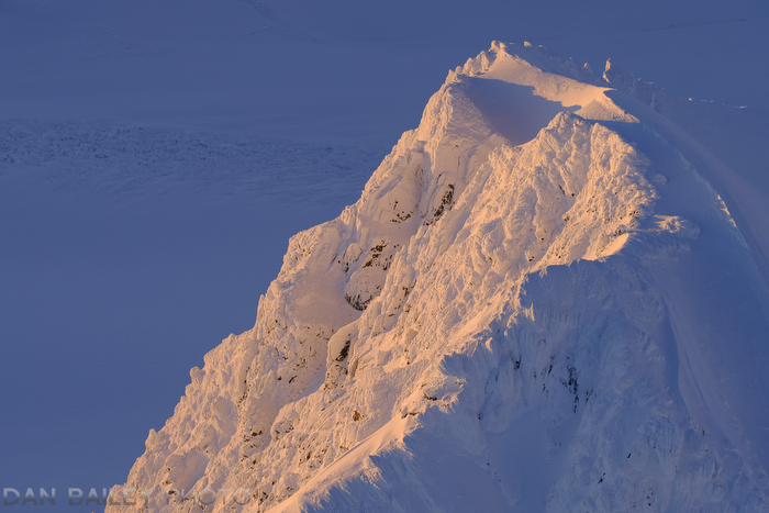 The sunset south flank of Peak 6870. Chugach Mountains, Alaska